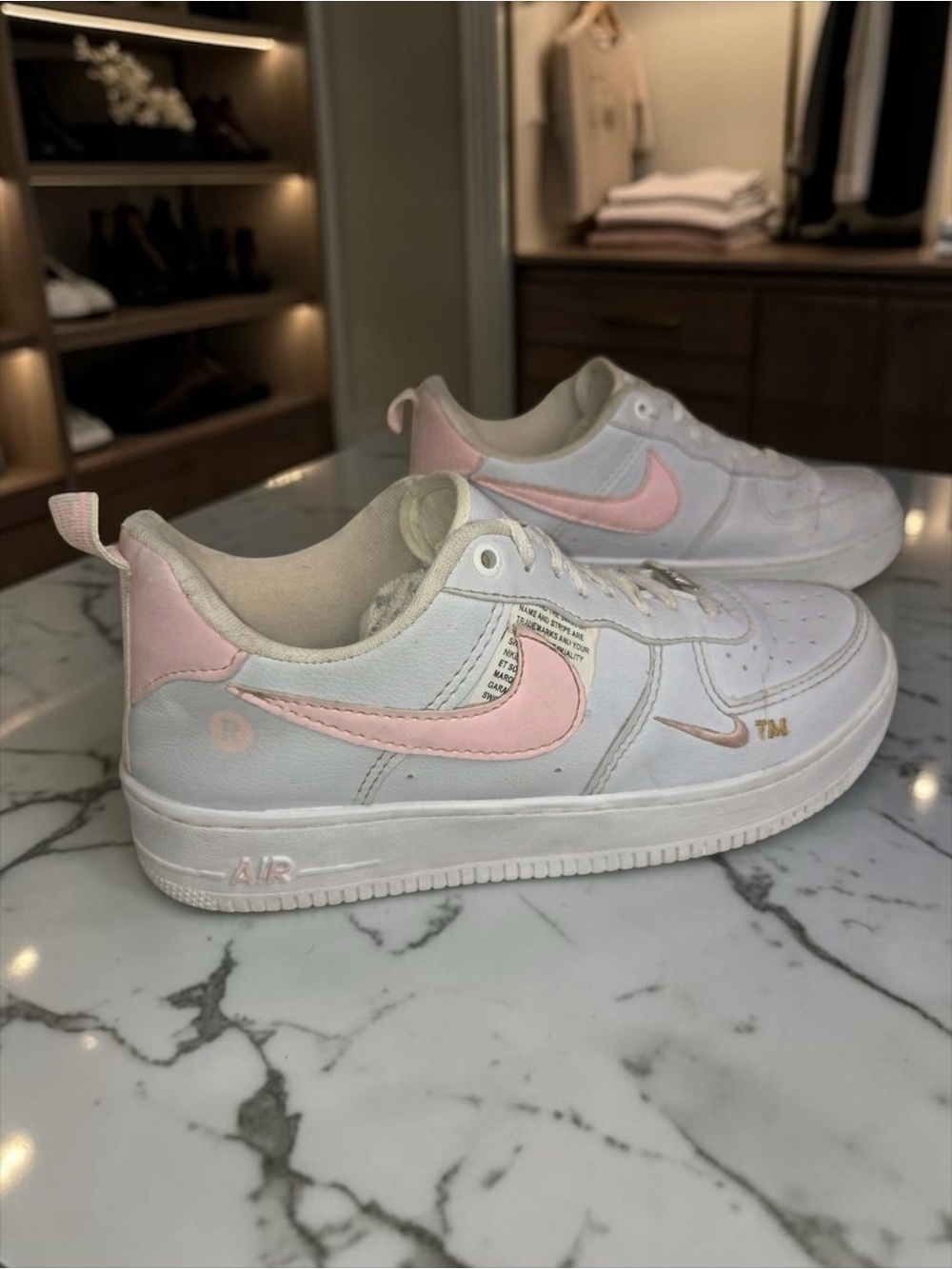 Nike White Sneakers with Pink Swoosh - Women's Athletic Shoes